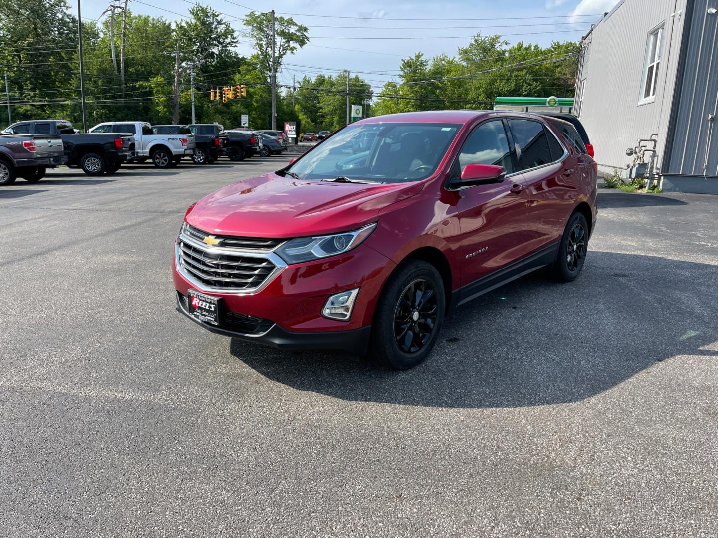 2018 Red /Black Chevrolet Equinox LT AWD (2GNAXSEV2J6) with an 1.5L I4 DOHC 16V TURBO engine, 6-Speed Automatic transmission, located at 11115 Chardon Rd. , Chardon, OH, 44024, (440) 214-9705, 41.580246, -81.241943 - This 2018 Chevrolet Equinox LT AWD with a 1.5L EcoTec Turbocharged engine and 6-speed automatic transmission offers a balanced blend of performance and fuel efficiency with a 30 MPG highway rating. This compact SUV is well-equipped for safety and convenience, featuring blind spot monitoring, rear cr - Photo#0